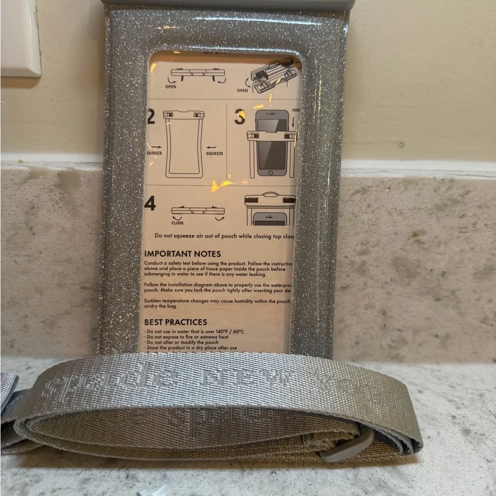 kate spade Silver Glitter Waterproof Phone Pouch with Shoulder Strap